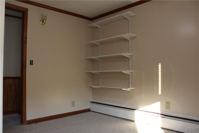 closet with a baseboard heating unit