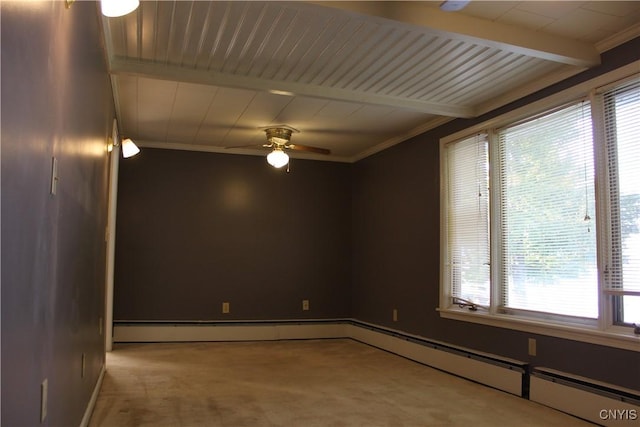 unfurnished room with ceiling fan, beam ceiling, light colored carpet, and a healthy amount of sunlight