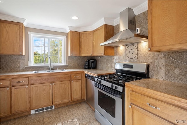 kitchen with sink, stainless steel appliances, wall chimney range hood, decorative backsplash, and ornamental molding