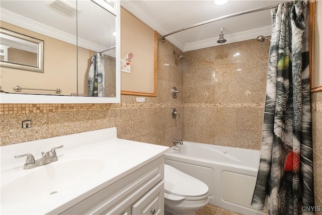 full bathroom featuring crown molding, toilet, shower / bath combo with shower curtain, vanity, and tile walls