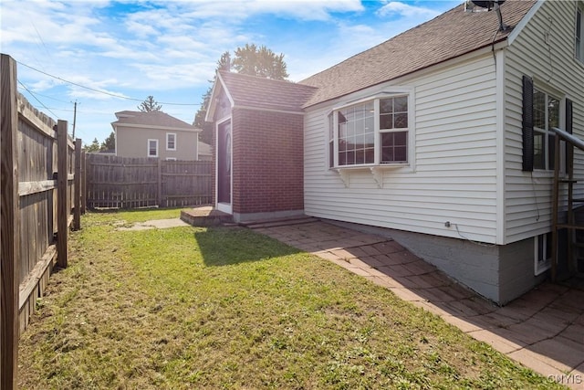 exterior space featuring a yard