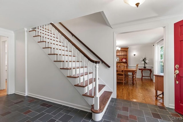 staircase with ornamental molding