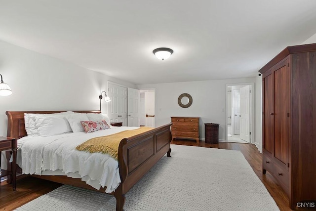 bedroom featuring dark hardwood / wood-style floors