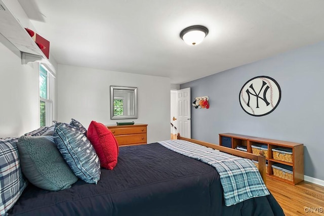 bedroom featuring hardwood / wood-style flooring