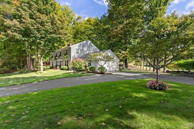 view of front of property with a front lawn