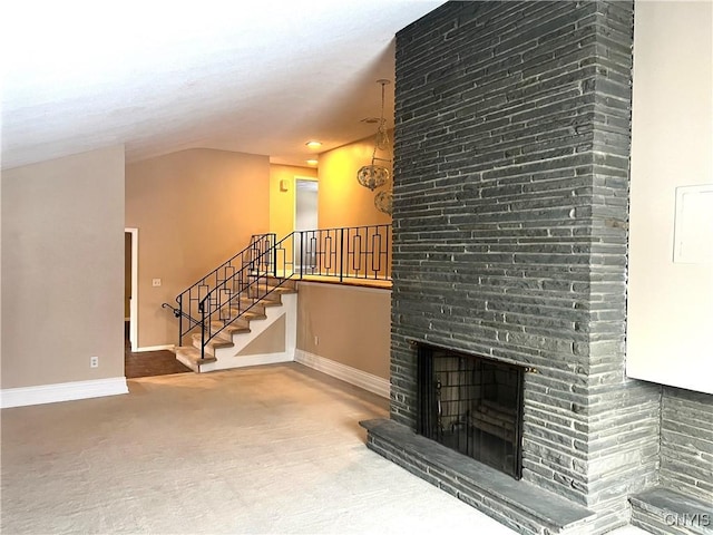 carpeted living room with a fireplace