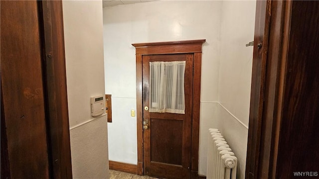 doorway featuring radiator