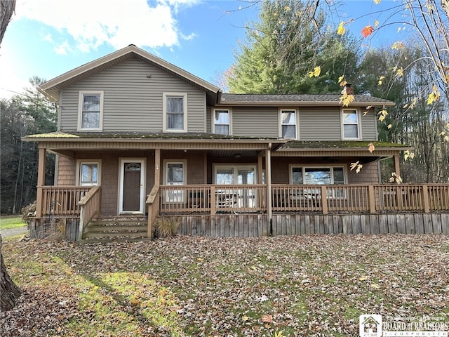 view of front of home featuring covered porch