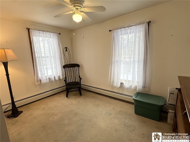 sitting room featuring carpet floors and ceiling fan