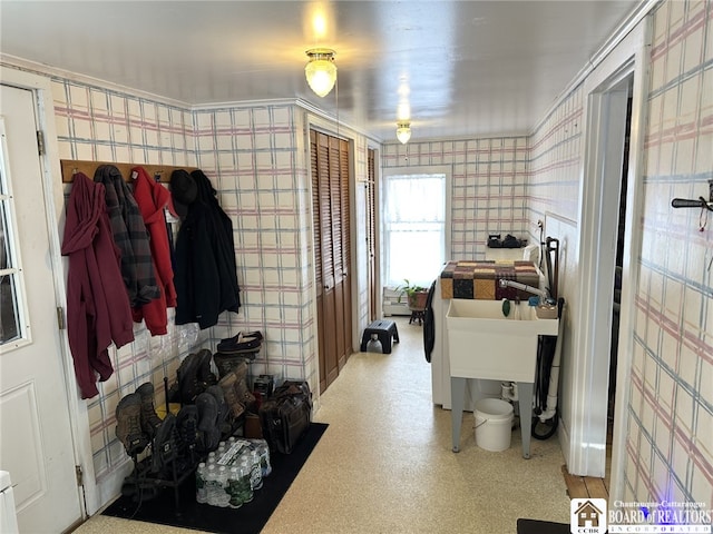 mudroom featuring baseboard heating