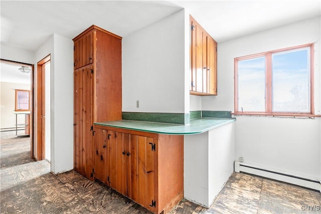 kitchen with a baseboard radiator