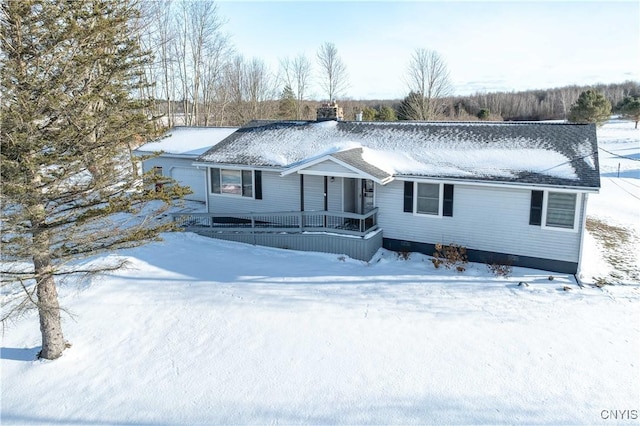 view of front of property featuring covered porch