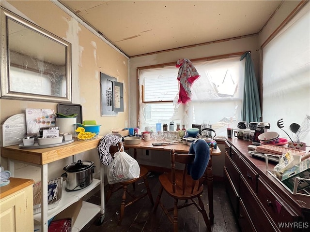 interior space with electric panel and ornamental molding