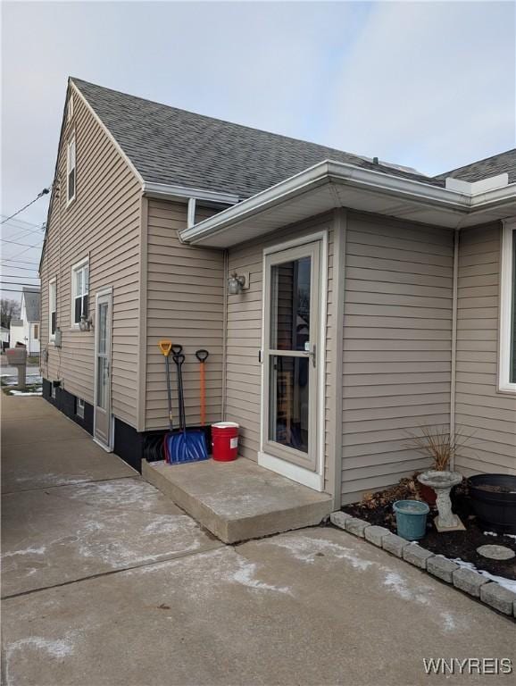 entrance to property with a patio area