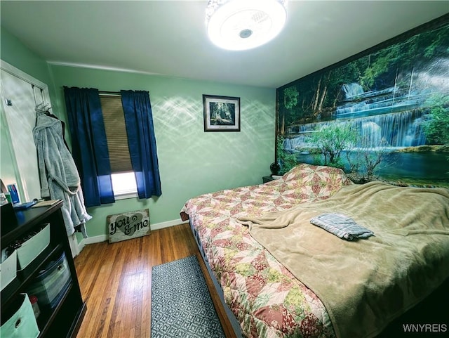 bedroom featuring wood-type flooring