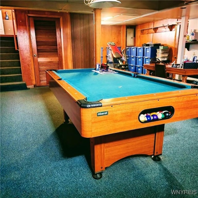 rec room featuring dark carpet, wooden walls, and billiards