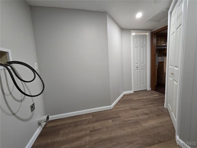 corridor featuring dark hardwood / wood-style floors