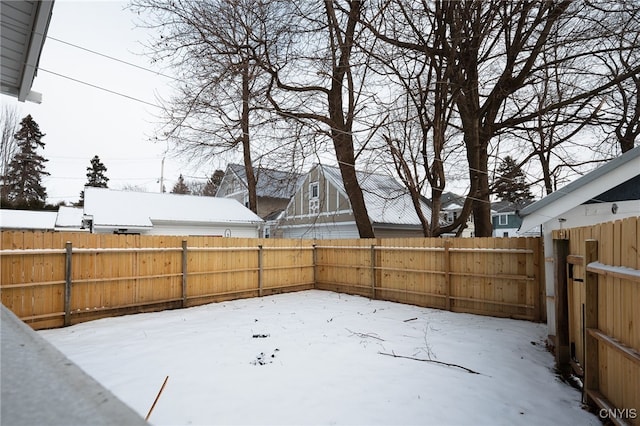 view of yard covered in snow