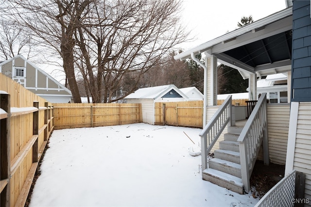 view of yard covered in snow