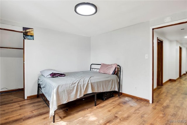 bedroom featuring light wood-type flooring