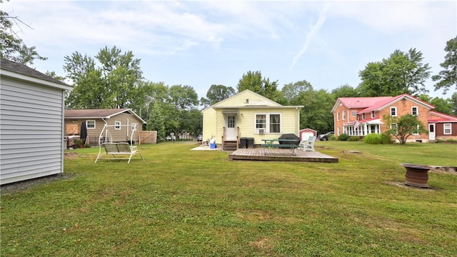 view of yard featuring a wooden deck