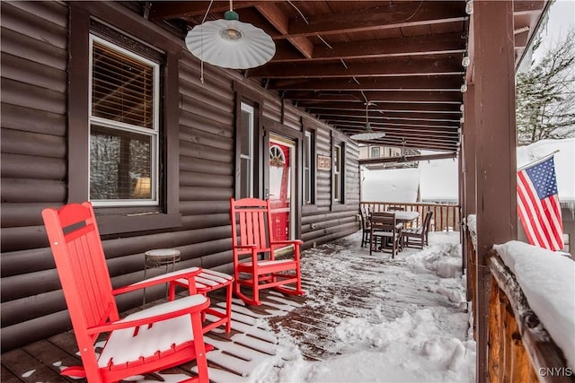 view of snow covered patio