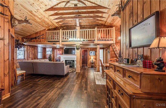 156 S Shore Rd, Webb, NY 13420 - living room with dark wood-style flooring, wooden walls, a fireplace, and wooden ceiling