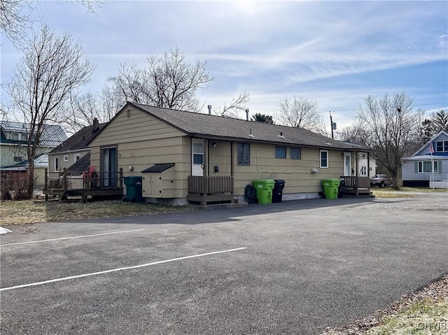 view of front of home with uncovered parking