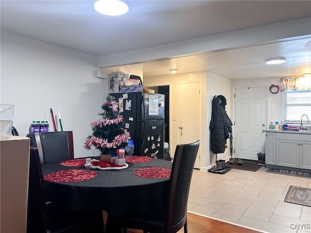 dining space featuring sink