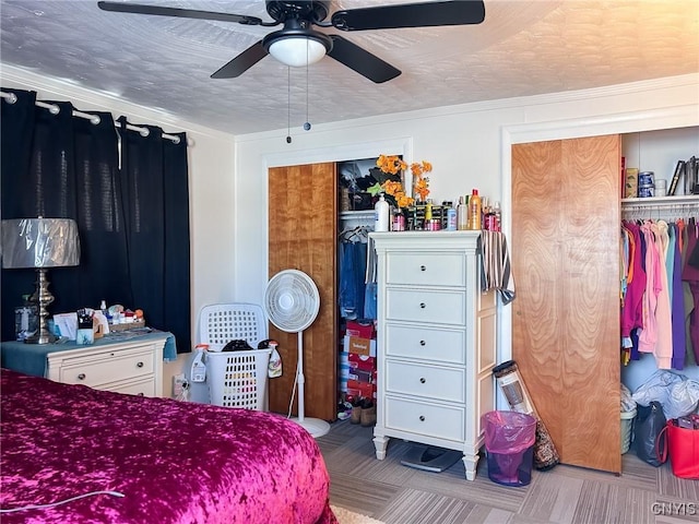 bedroom featuring a textured ceiling and ceiling fan