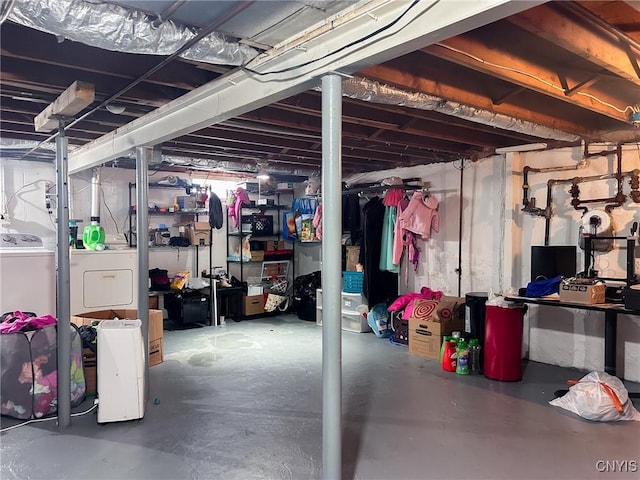 basement featuring washer and dryer