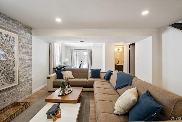 living room featuring french doors and hardwood / wood-style floors