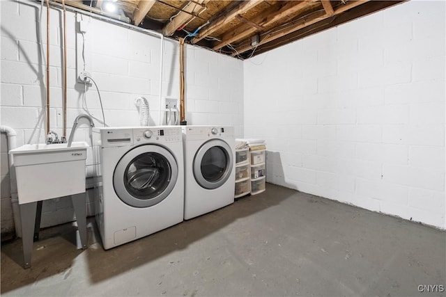 laundry area with washing machine and clothes dryer