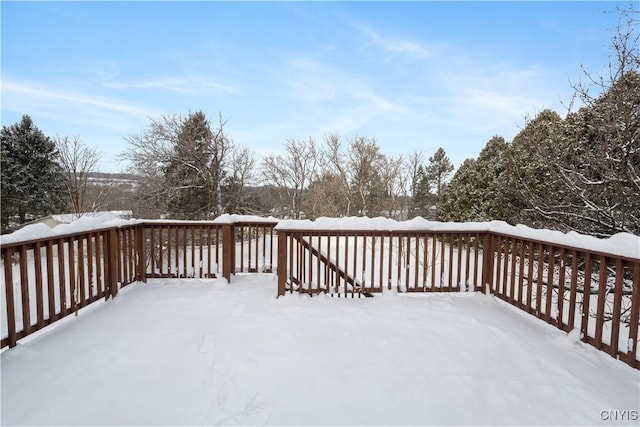 view of snow covered deck