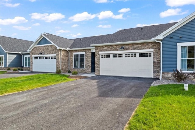 ranch-style house featuring a garage