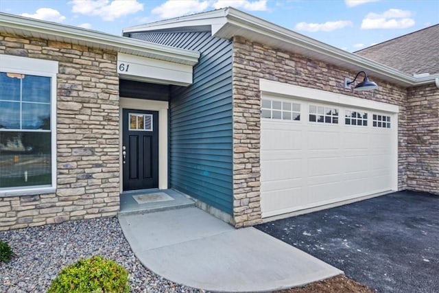 entrance to property with a garage