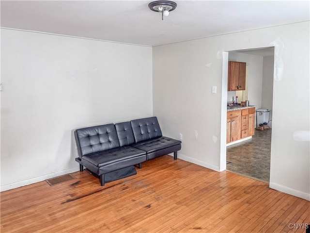 living area featuring light hardwood / wood-style floors