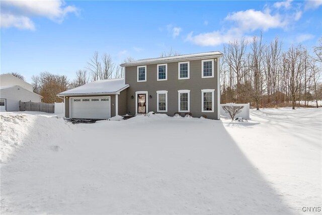 view of front of home with a garage