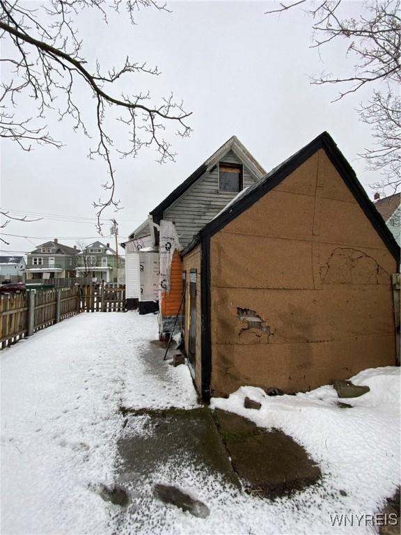 view of snow covered property