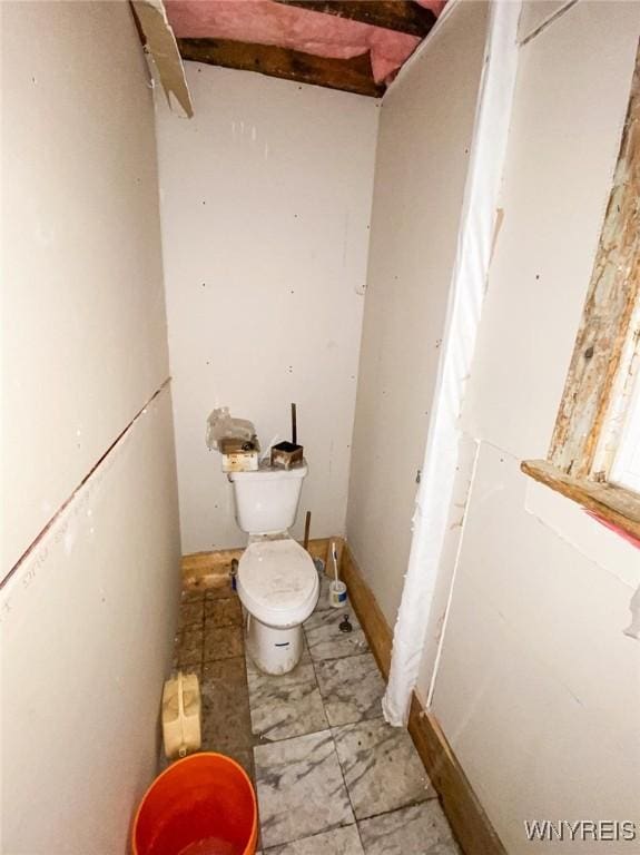 bathroom featuring toilet