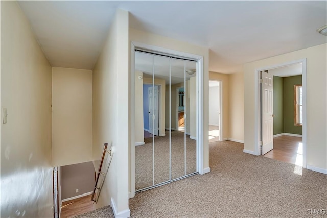 interior space featuring light colored carpet