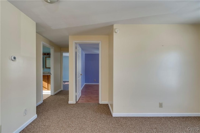 spare room featuring carpet flooring