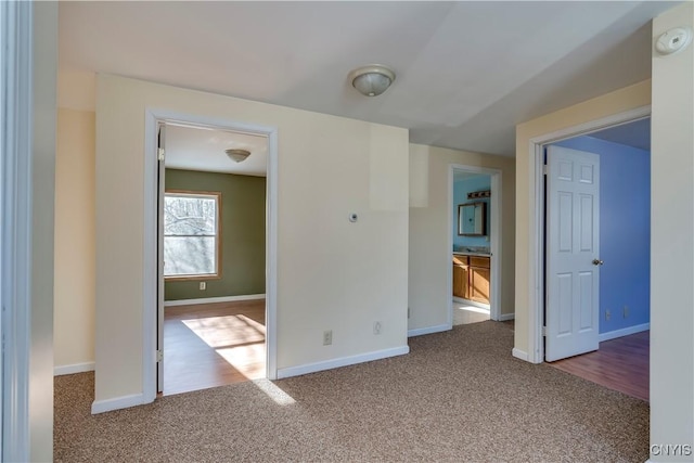 spare room featuring carpet floors