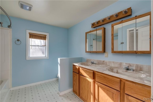 full bathroom with vanity, shower / bath combination, and toilet