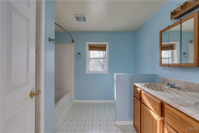 bathroom with vanity and shower / bathtub combination