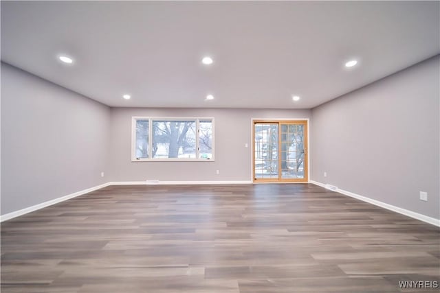 empty room featuring hardwood / wood-style flooring