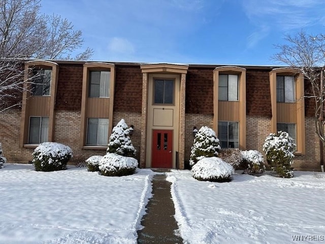 view of snow covered property