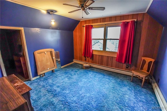 bonus room with a baseboard heating unit, ceiling fan, vaulted ceiling, and dark carpet