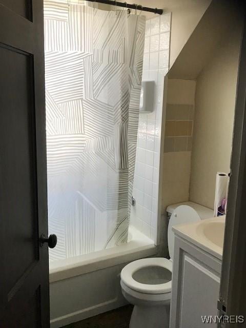 full bathroom with vanity, shower / bath combination with curtain, and toilet