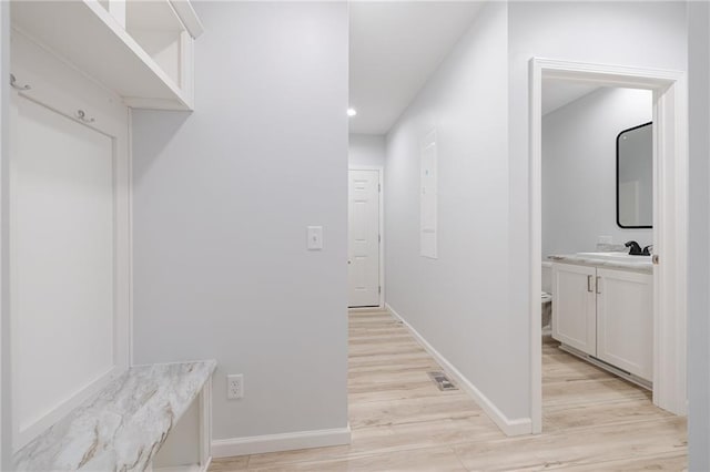 hall featuring light wood-type flooring